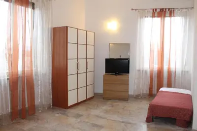 TV o dispositivi per l'intrattenimento presso B&B Soggiorno Ponte Rosso