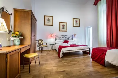 Letto o letti in una camera di HomEdo B&B
