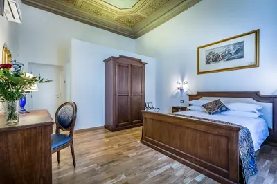 Letto o letti in una camera di HomEdo B&B