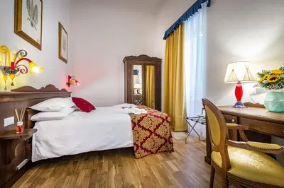 Letto o letti in una camera di HomEdo B&B
