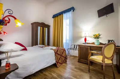 Letto o letti in una camera di HomEdo B&B