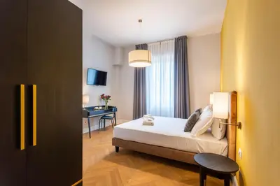 Letto o letti in una camera di 3110 ArtHotel