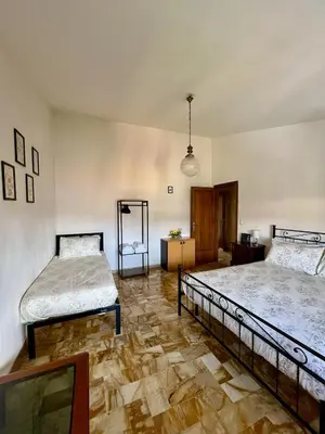 Letto o letti in una camera di Settesanti Vintage Attic