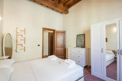 Letto o letti in una camera di Ognissanti apartment
