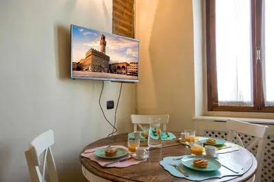 TV o dispositivi per l'intrattenimento presso Ognissanti apartment