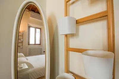 Letto o letti in una camera di Ognissanti apartment