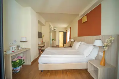 Letto o letti in una camera di Hotel della Signoria