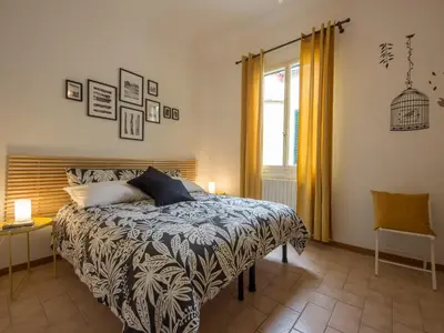 Letto o letti in una camera di San Lorenzo Family Apartment