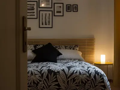 Letto o letti in una camera di San Lorenzo Family Apartment