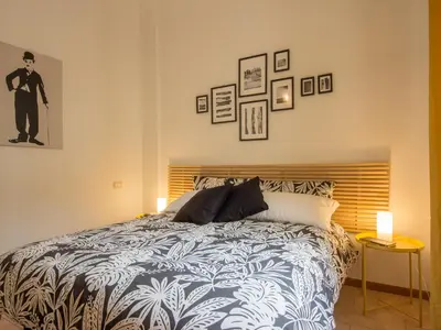 Letto o letti in una camera di San Lorenzo Family Apartment
