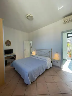 Letto o letti in una camera di Girasole House