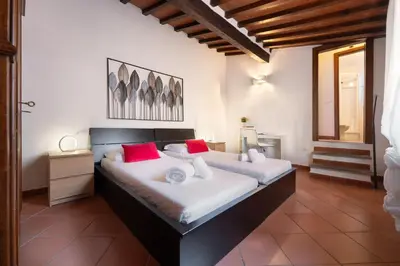 Letto o letti in una camera di Keys of Italy - Senese 38 - Two bedroom apartment close to city centre