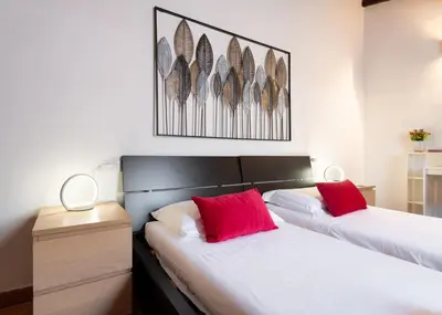 Letto o letti in una camera di Keys of Italy - Senese 38 - Two bedroom apartment close to city centre