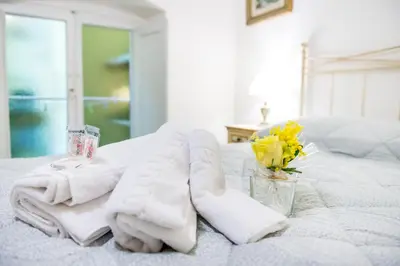 Letto o letti in una camera di Casa Savonarola Charme