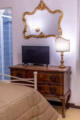 TV o dispositivi per l'intrattenimento presso Casa Savonarola Charme
