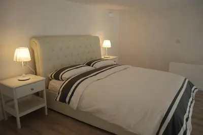 Letto o letti in una camera di Berardi Palace - Vigna Nuova Loft