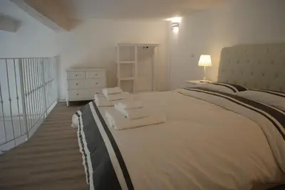 Letto o letti in una camera di Berardi Palace - Vigna Nuova Loft