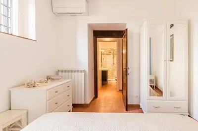 Letto o letti in una camera di DaLu Florence apartment Davide - private car park 15 minutes to the city center