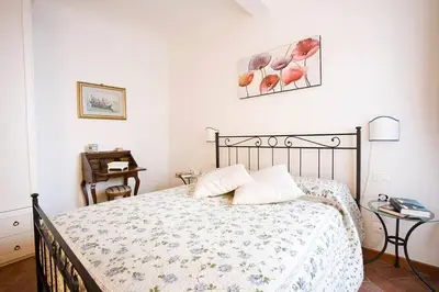 Letto o letti in una camera di Ellen's cozy apartment