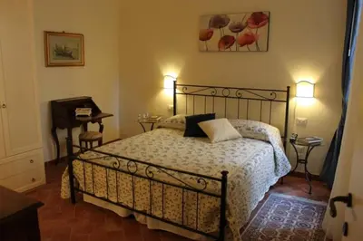 Letto o letti in una camera di Ellen's cozy apartment