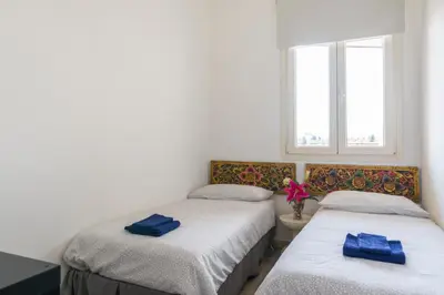 Letto o letti in una camera di GuestHost - Visarno Arena Apartment
