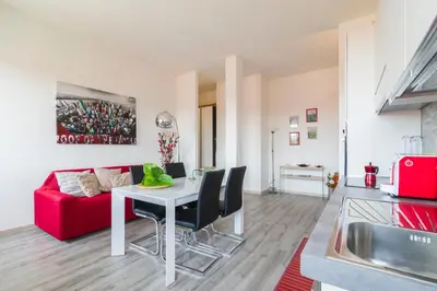 Area soggiorno di GuestHost - Visarno Arena Apartment
