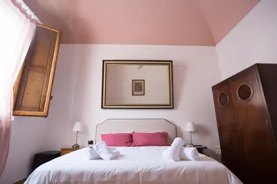 Letto o letti in una camera di Baldovini Home Stay, Close to the city center