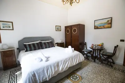 Letto o letti in una camera di Baldovini Home Stay, Close to the city center