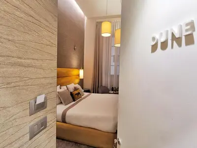 Letto o letti in una camera di Renascentia in Florence - Adults Only