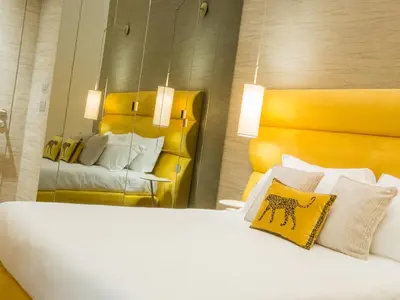 Letto o letti in una camera di Renascentia in Florence - Adults Only