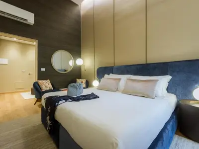 Letto o letti in una camera di Renascentia in Florence - Adults Only