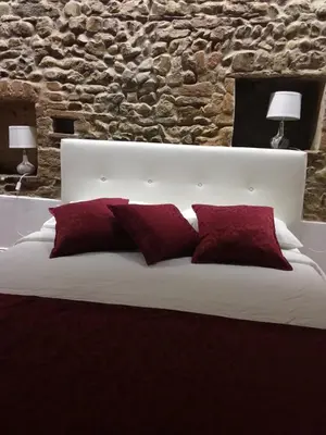 Letto o letti in una camera di Suite la Nicchia Guelfa