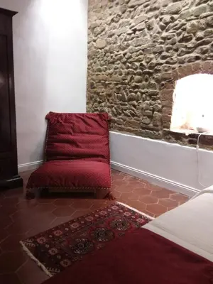 Letto o letti in una camera di Suite la Nicchia Guelfa