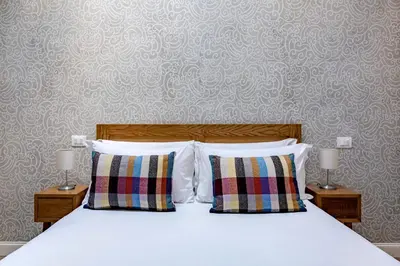 Letto o letti in una camera di Numa Florence Fiore