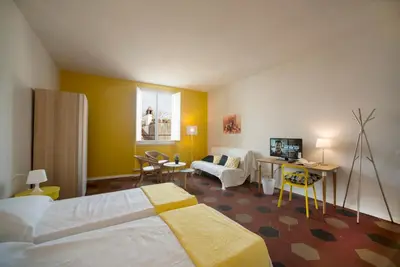 Letto o letti in una camera di Florence Oasis