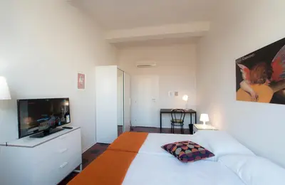 Letto o letti in una camera di Florence Oasis