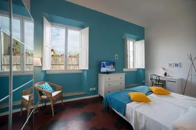 Letto o letti in una camera di Florence Oasis