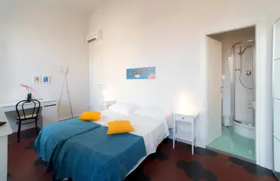 Letto o letti in una camera di Florence Oasis