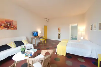 Letto o letti in una camera di Florence Oasis