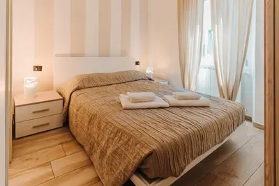 Letto o letti in una camera di I Fragoli a Santa Croce Apartments Florence