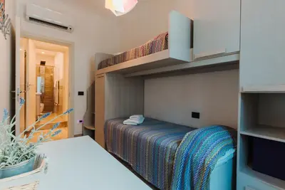 Letto o letti in una camera di I Fragoli a Santa Croce Apartments Florence