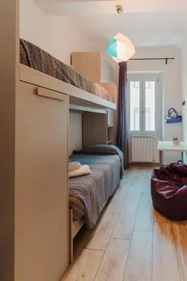 Letto o letti in una camera di I Fragoli a Santa Croce Apartments Florence