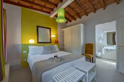 Letto o letti in una camera di Drom Florence Rooms & Apartments