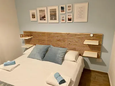 Letto o letti in una camera di Dimora Dionisio B&B