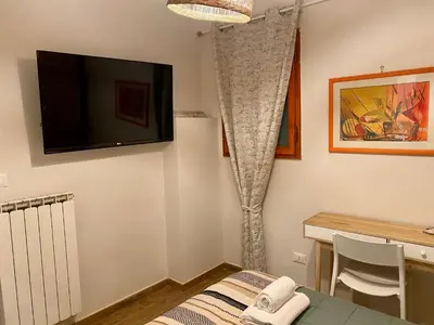 TV o dispositivi per l'intrattenimento presso Dimora Dionisio B&B