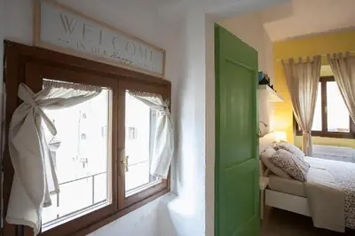 Letto o letti in una camera di La casetta dipinta 2.0