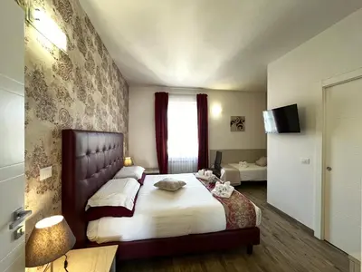 Letto o letti in una camera di Porta alla Croce Guest House