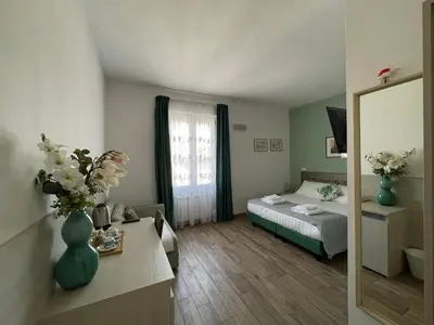 Letto o letti in una camera di Porta alla Croce Guest House