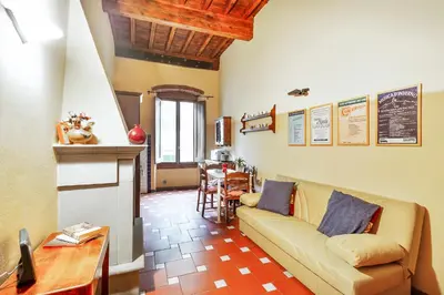 Area soggiorno di GuestHost - San Lorenzo Wooden Loft