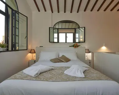 Letto o letti in una camera di Suites Cavour 34 by 360Rentals